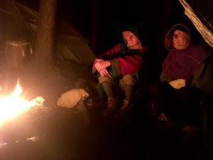 Around the fire at night