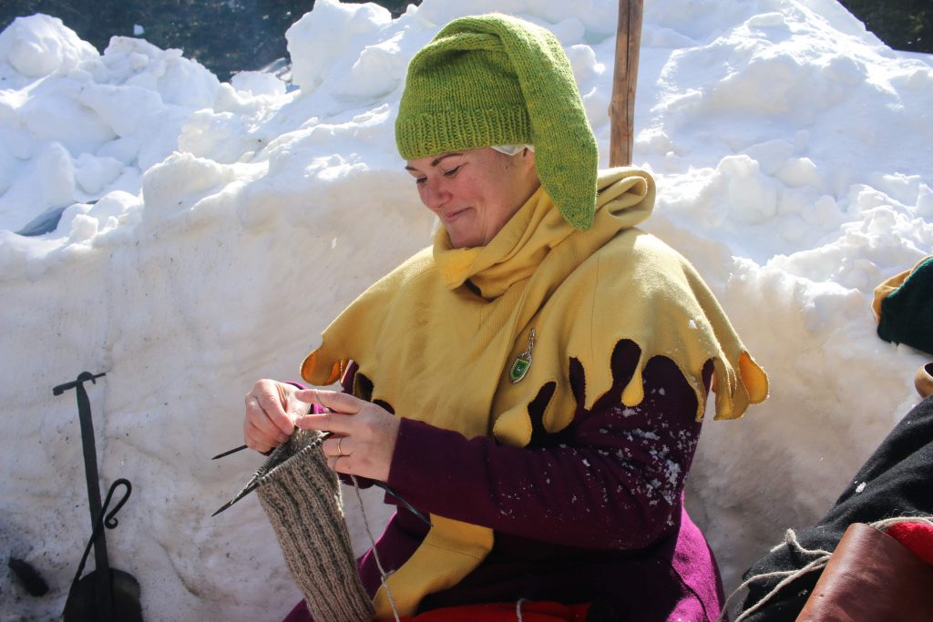 A picture of knitting in the snow, by Harrison Dreeves